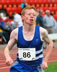  Jonnie Nisbet in the Under 15 Boys 1500m