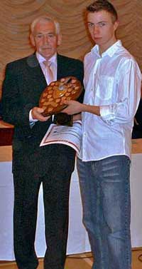 Nick Swinburn receives his award from Jim Alder